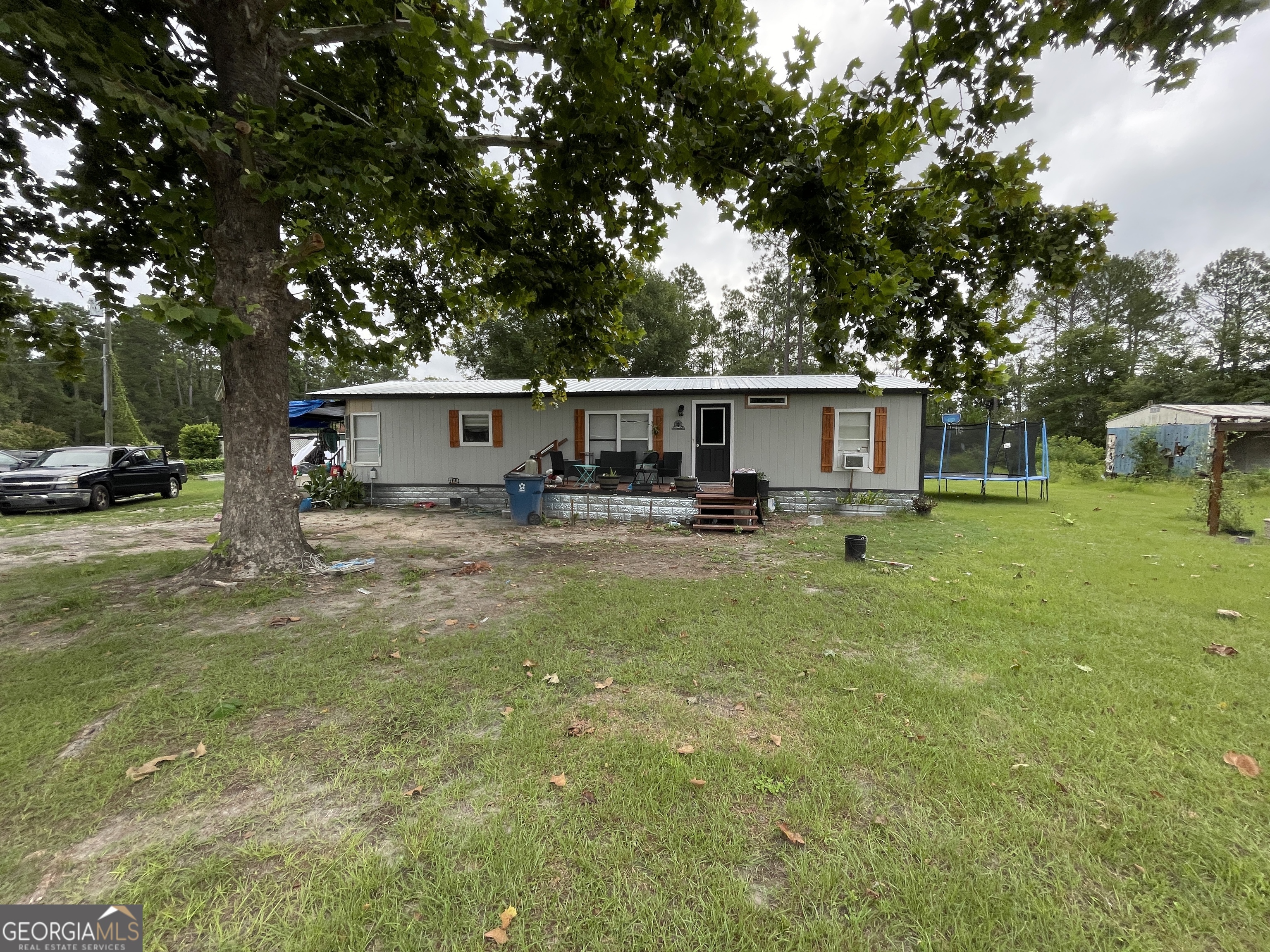 Enjoy the freedom of no HOA in this affordable mobile home! This residence features a practical combination of carpet and linoleum flooring throughout. It's a fantastic opportunity to bring your design ideas and add your own personal touches to make this space truly yours.