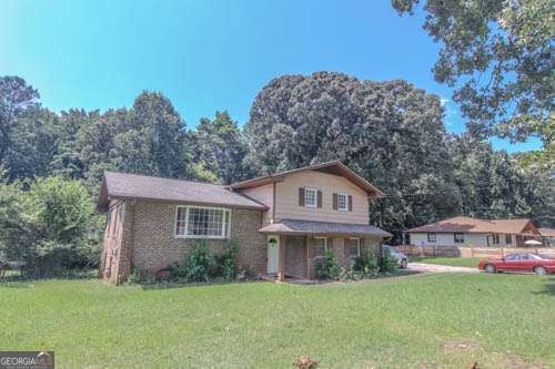 Photo of 434 Mountain Park Trl, Stone Mountain, GA 30087 (MLS # 10837861)