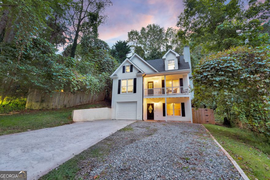 Welcome to 1330 Timber Lake Drive in Cumming, Georgia. This beautiful three-story home offers a flexible floor plan, plenty of natural light, and a fantastic location close to Lake Lanier, downtown Cumming, and award-winning Forsyth County schools.    You'll enter from the lower level, where you'll find a spacious media room or flex space that's perfect for a home theater, gym, or playroom. This level also includes a dedicated workshop/storage area, laundry room, and a one-car garage with plenty of extra storage space.    Head upstairs to the main living area where you'll find an open layout that's ideal for entertaining. The kitchen overlooks both the dining area and the living room, creating a seamless flow throughout the space. Just off the main living area, you'll find access to a private back deck and a fully fenced backyard, perfect for outdoor gatherings. With no HOA, the possibilities are endless! The primary suite is conveniently located on this level and features a walk-in closet, double vanities, a soaking tub, and a separate shower. A half bath is also located on this floor for guests.    On the top level, you'll find two large bedrooms that share a Jack-and-Jill bathroom. Each bedroom includes a walk-in closet, providing plenty of storage.    From its welcoming front porch to its flexible interior layout, this home is designed for both comfort and convenience. The location is unbeatable, offering easy access to Lake Lanier, GA 400, shopping, dining, and top-rated schools.