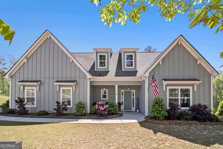 Craftsman-Style 5 Bedroom Home on Private Wooded Lot in Sought-After Location. Discover this beautifully crafted 5 bedroom, 4 bath Craftsman-style home, built in 2019 and perfectly situated on over 1 acre of private, wooded land. With a level driveway and 2-car garage on the kitchen level, everyday convenience meets timeless curb appeal. Inside, you'll find an open-concept layout with vaulted ceilings and natural light pouring into the spacious Great Room. The modern kitchen features white cabinets, stainless steel appliances, and a breakfast room with large windows overlooking the fully fenced backyard, ideal for entertaining or relaxing with a view. A separate, light-filled dining room offers space for hosting special occasions or enjoying quiet meals at home. The highly sought-after primary suite on the main level includes a spa-inspired en suite bath with a soaking tub and separate shower. Additional secondary bedrooms are generously sized, each with access to private or en suite bathrooms, perfect for guests, family, or a home office. Step outside to a private backyard oasis complete with a patio, ideal for grilling, outdoor dining, or enjoying the peace of the surrounding trees. This move-in-ready home offers the best of both worlds: Modern construction with high-end finishes, all nestled in a tranquil, nature-filled setting. Whether you are looking for a spacious home or a quiet retreat, this one checks every box. Schedule your showing today and experience this stunning Craftsman home for yourself!