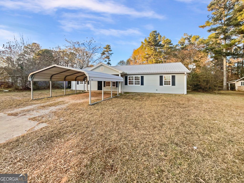 Photo of 2855 W Highway 166, Carrollton, GA 30117 (MLS # 10660344)