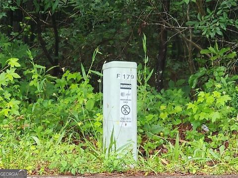 Photo of 179 ASHLEY TRACE Drive, Locust Grove, GA 30248 (MLS # 10645511)