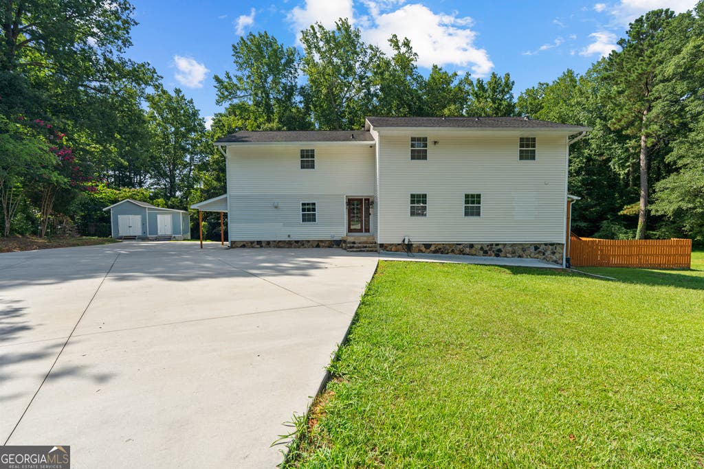 Photo of 7326 Leland Lane, Jonesboro, GA 30236 (MLS # 10806389)