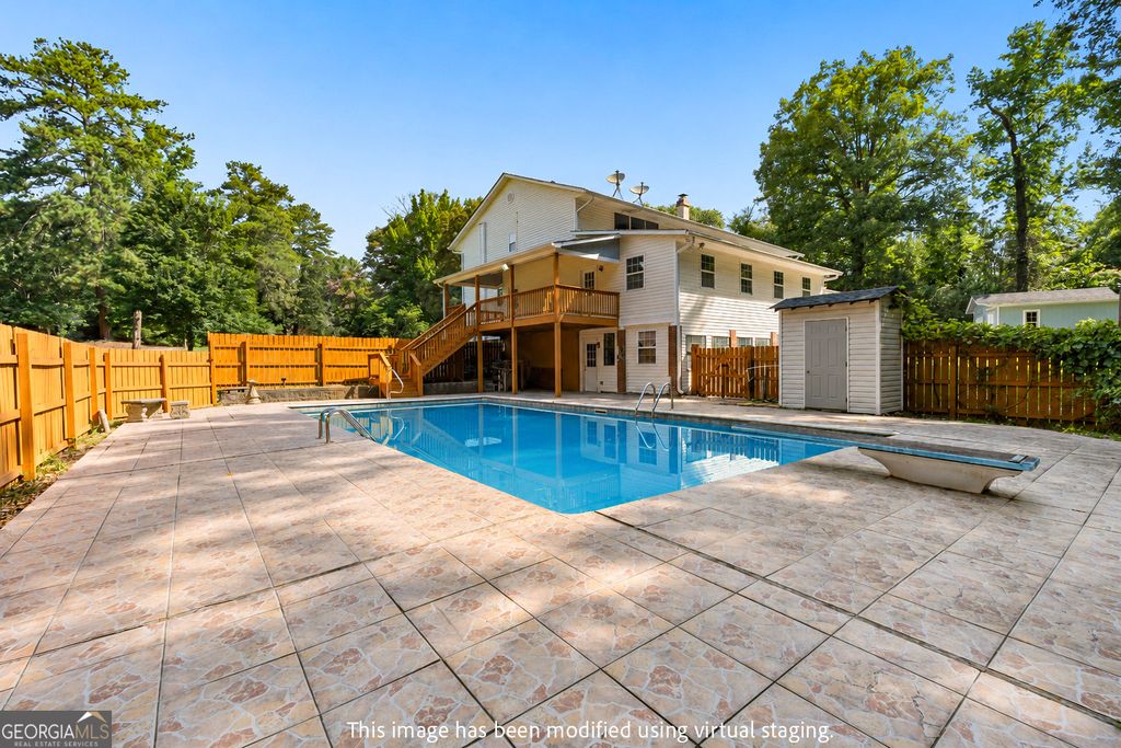 Photo of 7326 Leland Lane, Jonesboro, GA 30236 (MLS # 10806389)