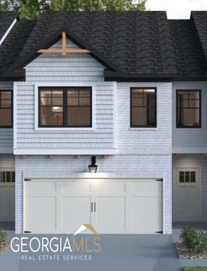Exciting News! Our beautiful home is now available at a newly reduced, unbeatable price, making it the perfect time to seize this incredible real estate opportunity. The Hanover, our beautifully designed 2-story home located in one of Georgia's few cities with old town charm and easy access to Atlanta. Home is an end unit and is designed with front garage entry and a beautiful open concept. Features high smooth ceilings, with recess lighting, electric fireplace and durable hard surfaced floors on main level and stairs, carpet on 2 level. Home also includes granite countertops with tile backsplash in kitchen, stainless steel appliances, open view to living & dining areas. The Hanover floor plan also features an oversized owners retreat, with dual vanities, separate tub & shower, and huge walk-in closet. Favorable sized secondary bedrooms, private fenced in backyards (per plan), and so much more. Contact us for an appointment for a tour and to find out more about other floor plans & how you can take advantage of our incentives with preferred lender. **Photos are from another home, please note home is under construction. Photos are for reference use only**