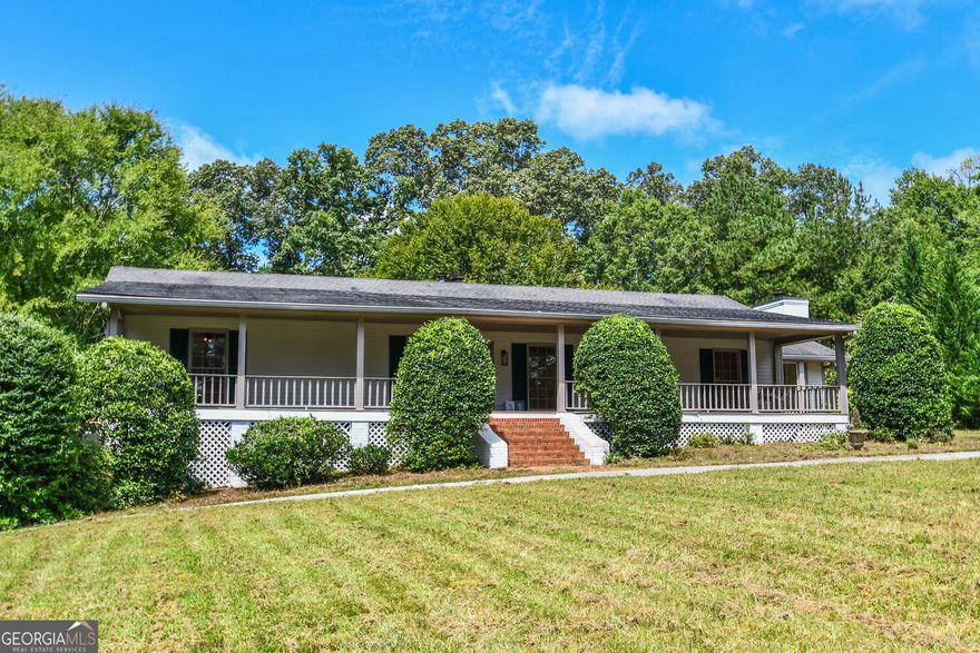 Renovated Ranch on Basement - Approx. 6 Private Acres in Alpharetta, GA, Cherokee County. This beautifully renovated 4-bedroom, 3-bath ranch sits on nearly 6 serene acres, offering unmatched privacy, space, and versatility-all with lower Cherokee County taxes and no HOA restrictions. Situated on a private lot with a long driveway, this home offers both seclusion and convenience. Step inside to find a fully updated, move-in-ready interior featuring stylish finishes, an open-concept layout, and modern upgrades throughout. The spacious main level includes a bright living room, a fully renovated kitchen with sleek cabinetry and new appliances, and generously sized bedrooms. Outside, the possibilities are endless-grow your dream garden, add a pool, or cast a line in your very own pond. With almost 6 acres to work with, this is truly a rare opportunity to live, play, and relax on your own terms. This is a rare opportunity to own a turnkey property with privacy, space, and low Cherokee County taxes-all in a prime Alpharetta location.