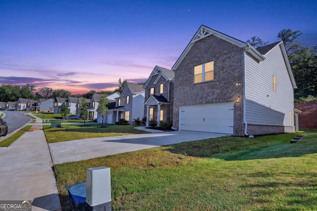 Photo of 3117 Thicket Lane, South Fulton, GA 30349 (MLS # 10825681)