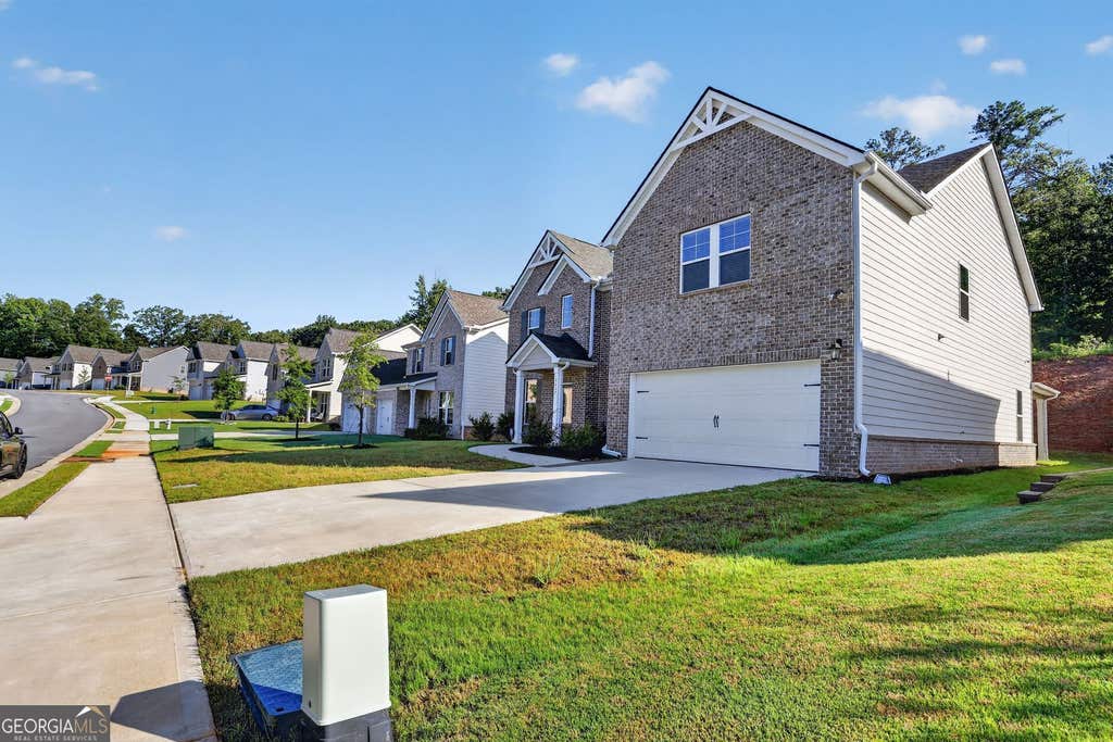 Photo of 3117 Thicket Lane, South Fulton, GA 30349 (MLS # 10825681)