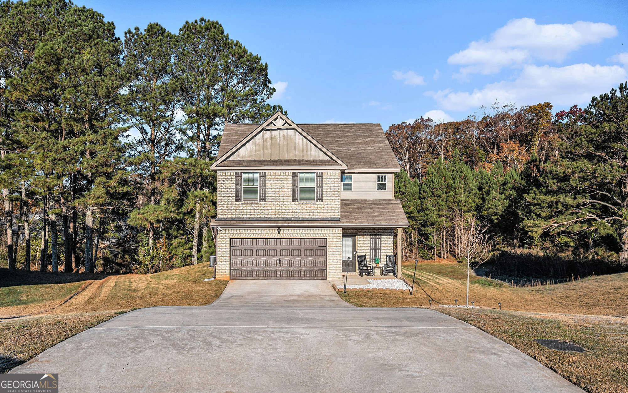 It's a beautiful day in the Barnes Station neighborhood as you make your way to this valuable gem at the end of cul-de-sac on large .79 acre lot with tree line view in back yet convenient to I 75, Tanger Outlets, shopping, schools, Hartsfield Jackson airport and more. Nearly new built in 2022 by Capshaw Homes as the Springdale Plan with brick and Hardie board siding, the main level offers 9 foot ceilings in kitchen, dining, half bath and garage all on main level with low maintenance luxury vinyl plank (LVP) flooring beneath your feet. Kitchen has 42" cabinets, granite counters, tile backsplash and breakfast bar along with stainless steel appliances, recessed lighting and Venetian bronze fixtures. Making your way to the second level, the primary suite has soaring vaulted ceiling and bath with double vanity, separate tub and shower. Two additional bedrooms and bath are down the hall. Situated on one of the largest lots in Barnes Station, you'll have loads of space for outdoor activities, gardening, playing sports or hosting gatherings. Conveniently located near Locust Grove Elementary, Middle, and High Schools all you want or need is within mere minutes of this value priced investment that sold for 304k in 2023 and now priced under 300k!