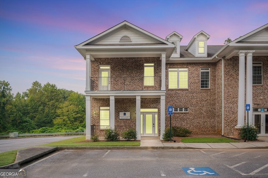 Positioned between North Point Mall and Avalon with immediate access to GA-400, this professional office suite offers the space, layout, and location ideal for business owners ready to establish or grow their presence in Alpharetta. The property is located on the second level and includes four private offices, a reception area, a dedicated bathroom, and a kitchenette, 9' ceilings and excellent natural light. Ample on-site parking, well-maintained landscaping, and front and rear entry porches complete the package. Whether you're in legal, financial, tech, or medical services, this space is designed to support day-to-day operations in a location that connects you to Alpharetta's business and lifestyle centers.