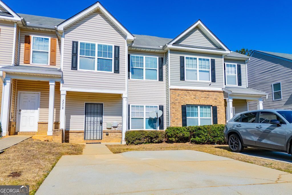 Photo of 2258 Bigwood Trail, Atlanta, GA 30349 (MLS # 10694445)