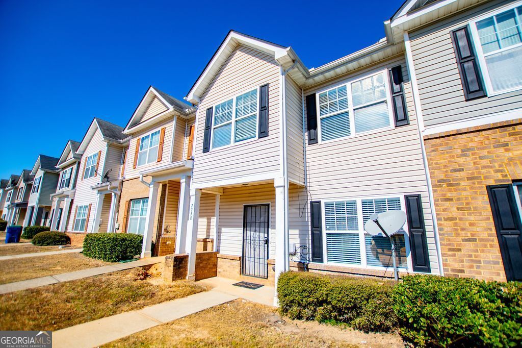 Photo of 2258 Bigwood Trail, Atlanta, GA 30349 (MLS # 10694445)