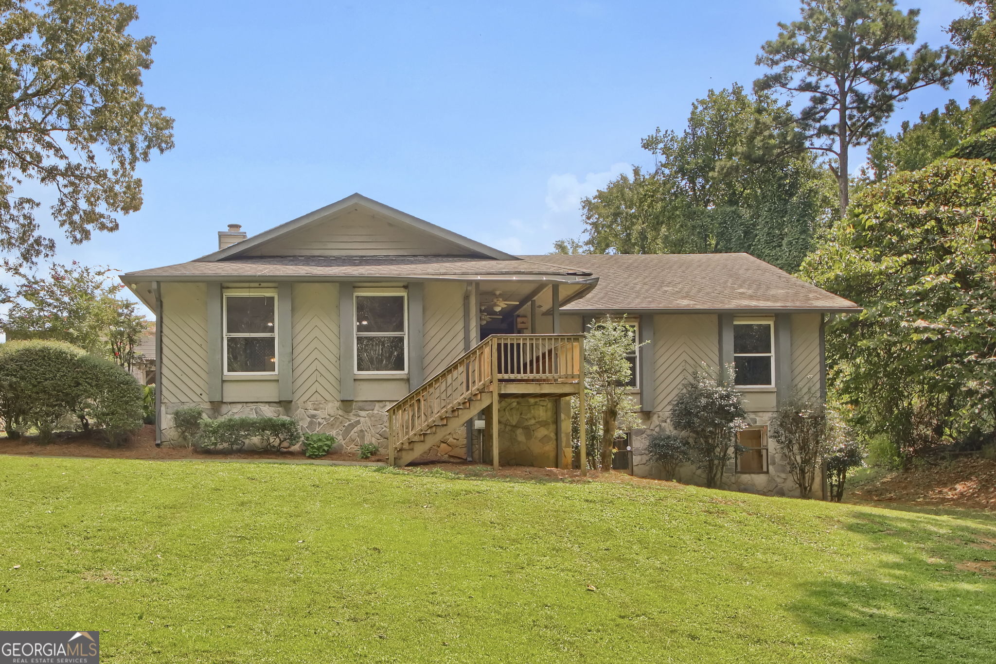 Spacious 6-Bedroom Estate on Private Cul-de-Sac in Rockdale County Welcome home to nearly 4,800 square feet of living space, perfectly designed for comfort, convenience, and entertaining. Nestled on 1.17 acres in a sought-after established cul-de-sac, this residence offers the privacy of suburban living with room to spread out both indoors and outdoors. Main Level Highlights * 4 bedrooms and 2.5 baths on the main level * Master retreat with dual oversized his & hers closets, French doors overlooking the backyard, and a spa-like bath featuring a separate shower and a garden jacuzzi tub with serene views * Formal dining room plus a separate eat-in kitchen for family meals and gatherings * Screened-in back porch leading to a fenced yard, perfect for enjoying quiet evenings or morning coffee Finished Basement Retreat * 2 additional bedrooms, a full bath, and a second kitchen-ideal for in-laws, guests, or extended family * Oversized living room with sliding glass doors that open to the backyard Outdoor Features * Fenced-in backyard with space to garden, play, or relax * A separate greenhouse for year-round planting * A large workshop of over 200 sq. ft. with an extended covered area for projects, storage, or outdoor entertaining The Opportunity This home is move-in ready but also offers incredible potential with some updating. The solid bones and flexible layout make it a perfect canvas to create your dream home. And with the price set well below appraised value, you'll walk into this property with instant equity-an opportunity rarely found in today's market. This property blends elegance, function, and space in one of Rockdale County's most desirable private neighborhoods. With its versatile floor plan, multiple living areas, and outdoor amenities, it's the perfect home for families, multi-generational living, or anyone seeking a peaceful retreat.