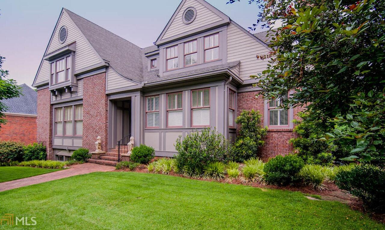 Stunning 1998 Arts & Crafts custom home in the Historic Section of Avondale Estates! From the moment you walk in, you realize what a difference the noted architect brings to this home. The custom touches, from the higher ceilings & cust. molding, gleaming walnut floors, large rooms, built-ins & overall flr plan, are exceptional. Enjoy a wonderful home to entertain larger groups and enjoy versatile rms like the main level home ofc/library/fam rm, all in one, spacious livrm & dinrm, lge eat-in kit + stunning mstr on the main + lge lndry rm & wrk space for a 2nd ofc.