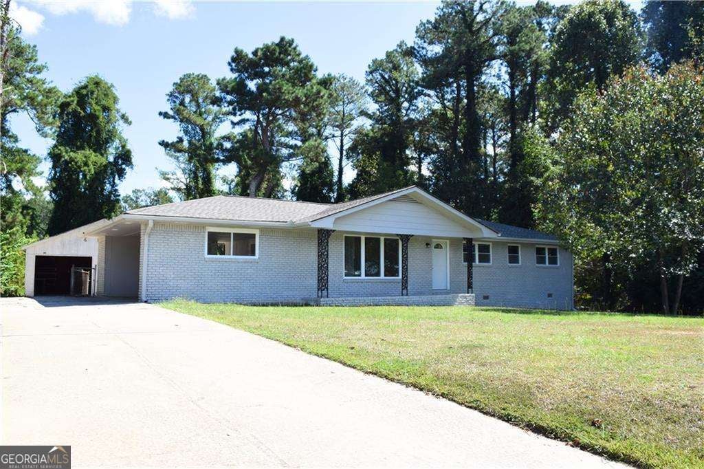 Photo of 7012 Church Street, Riverdale, GA 30274 (MLS # 10803588)