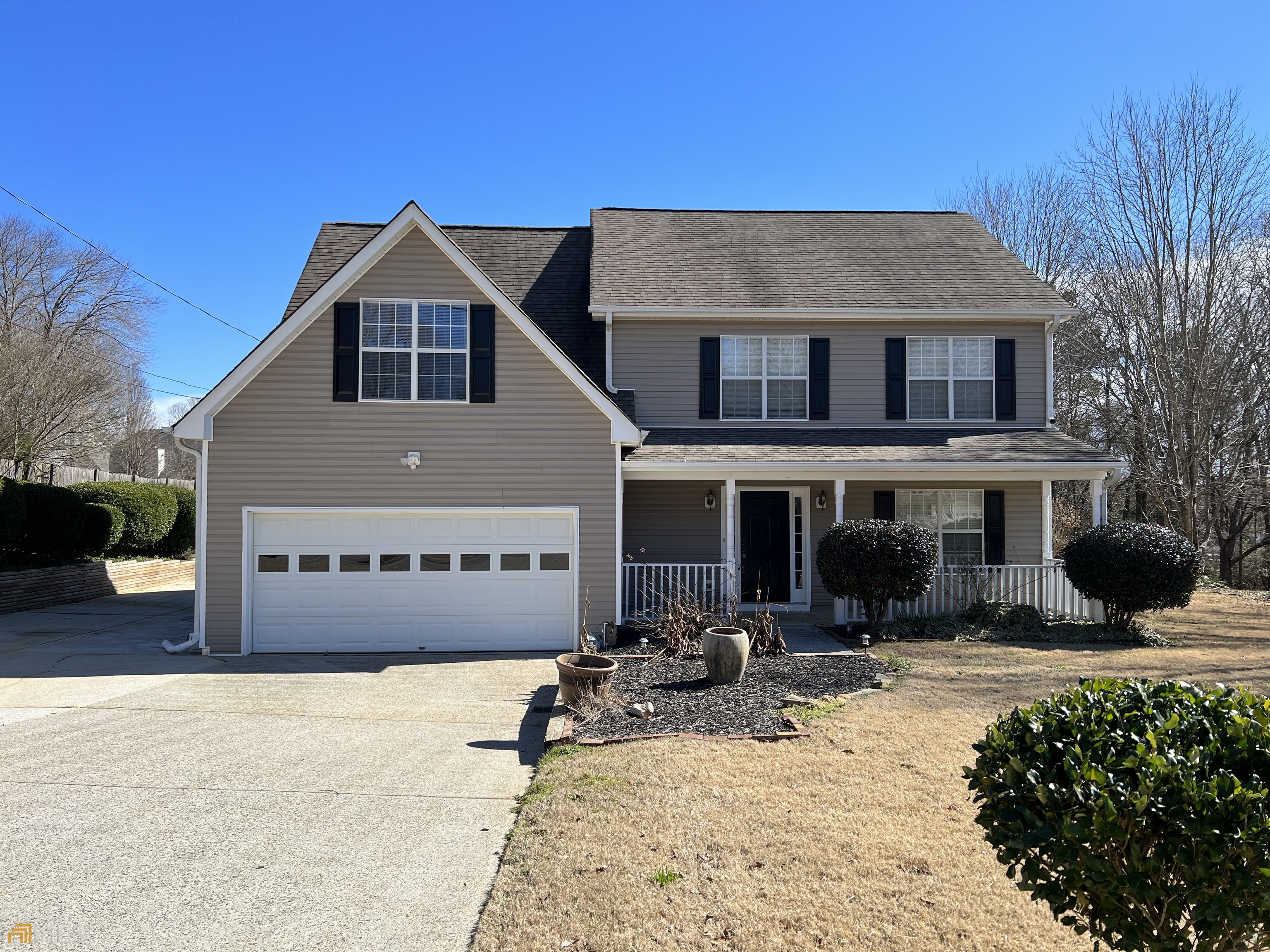 The 4 bedrooms, 2 full & 1 half baths home with over 2,800 square feet of living on 0.56 acre in very quiet neighborhood. This home offers a great floor plan that includes both a family room with built in shelving and a wood burning fireplace, a formal living room, an eat in kitchen complete with a breakfast area, a formal dining room, a huge master suite upstairs along with 3 other bedrooms. The backyard is beautifully landscaped with lots of room to entertain and kids playground set. Additional parking on an extended driveway to the left of the home as well as a 2 car garage. This beautiful 2 story home is perfectly located in flowery branch, just minutes from I-985, Lake Lanier, Duncan Corners shopping center, Northeast GA Medical Center, and close to the Mall of Georgia and Chateau Elan Winery and Resort.