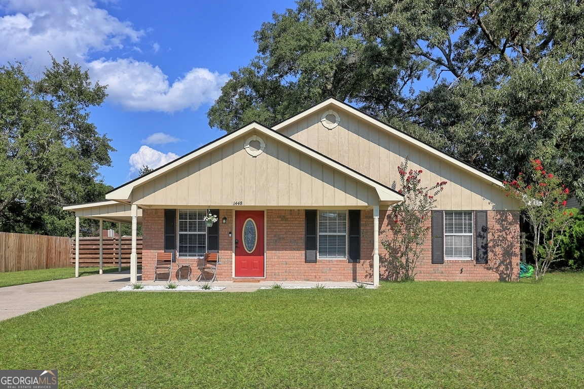 Welcome Home! 1448 Coalition Circle, Hinesville GA - a charming and well-maintained single-story home offering comfort, convenience, and space both inside and out. This 3-bedroom, 2-bathroom home features a bright living room complete with a cozy fireplace, perfect for relaxing evenings. The kitchen is equipped with stainless steel appliances, abundant cabinetry, and generous counter space for cooking and entertaining. Step outside to a large, fenced backyard that includes a spacious shed-ideal for storage, hobbies, or outdoor projects. A carport and off-street parking provide added convenience. Situated in a prime location just minutes from Fort Stewart, shopping, and restaurants, this property combines everyday practicality with an easy lifestyle. Best of all, there are no HOA restrictions.