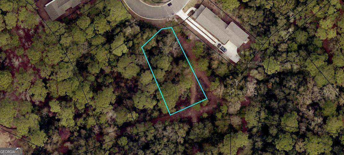 Ready to build your dream home? This lot is in the beautiful subdivision of Cumberland Harbour. Enjoy the fitness center, pools, day dock, and pickleball in this charming, gated community. It's minutes from historic downtown St. Marys, with ferry access to Cumberland Island and a short drive to Jacksonville and Amelia Island. It's also close to Kingsbay Naval Submarine Base, Jacksonville International Airport, shopping, FLETC, and Brunswick, GA. Build your coastal dream home in Cumberland Harbour and experience the best of coastal living. The gated community has restricted access, so showings require advanced notice, and interested parties must be accompanied by a licensed real estate salesperson.