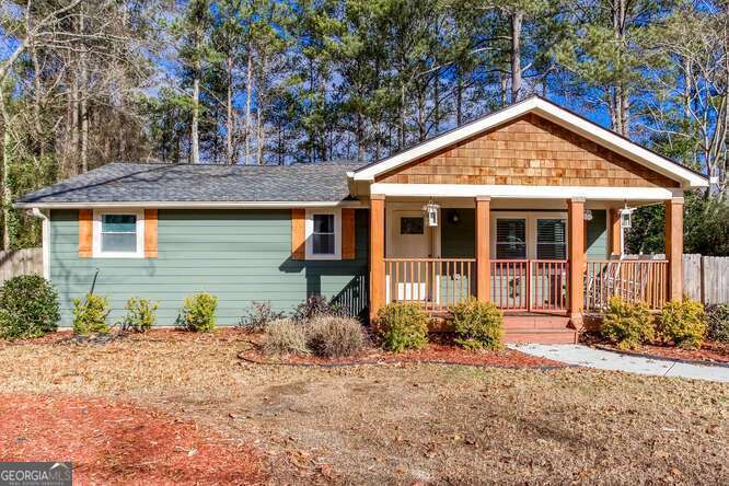 Come and Tour this Beautiful 4 bedroom 3 bathroom ranch in Marietta, ga! This home boasts ample backyard space that is kept private with a tall fence. Nice covered front porch that invites you into the open floor plan giving you access to be creative with your dining and living room area. The gorgeous kitchen has a dishwasher and oven/range combo installed in The island. Let's not forget the 3 well sized bedrooms situated after the hallway laundry room for easy routine work around the home that has great shelf storage. This awesome home sits on a level lot and plenty of yard to make it own! Come see it today!
