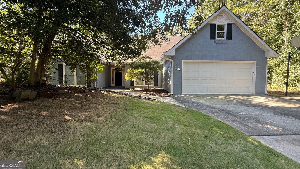 Photo of 2970 Heather Stone Way, Lawrenceville, GA 30043 (MLS # 10872470)