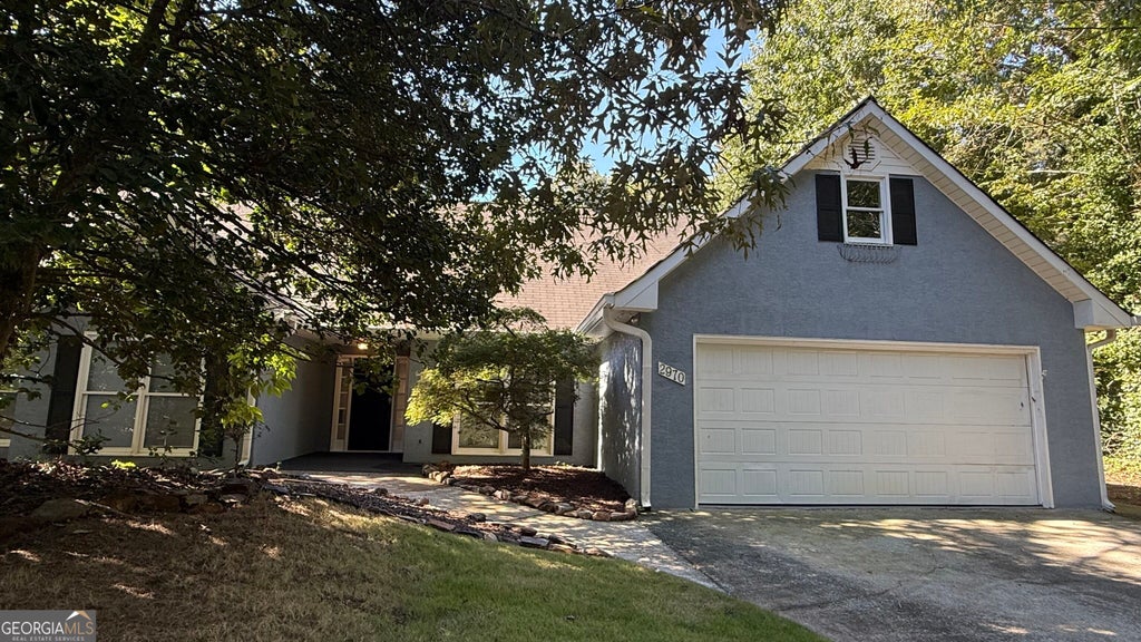 Photo of 2970 Heather Stone Way, Lawrenceville, GA 30043 (MLS # 10872470)