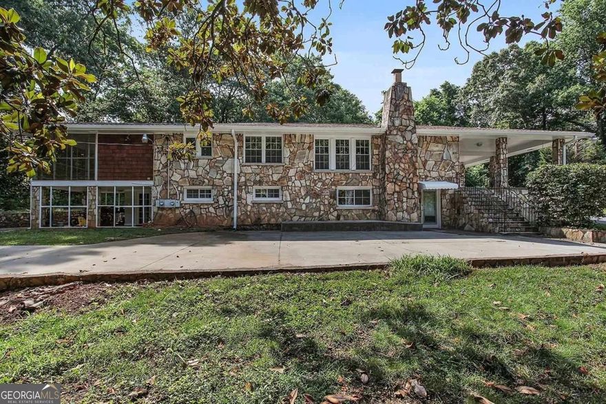 Discover peaceful living in this charming home in Marietta. Nestled on a serene acre, this 3-bedroom, 2-bathroom residence offers a spacious main-level layout, ideal for both relaxation and entertaining. A large circular driveway welcomes you, and the inviting patio is perfect for enjoying winter's crisp air. Inside, the living room features a grand fireplace, providing warmth and comfort on those chilly winter evenings. The open floorplan flows effortlessly, making it easy to host guests, enjoy family dinners, or entertain with ease. The kitchen is a chefCOs dream, with abundant cabinet space for storage and organization. The master bedroom is generously sized, complete with a private en suite bathroom for added comfort and convenience.    Property is also available for shorter lease terms. See FMLS#7497501    Low credit ok, but no evictions. Monthly income must be 2.5X monthly rental amount to qualify. Renters insurance is required (can be as low as $15/month). Application fee is $45 per adult who wishes to live in the home.