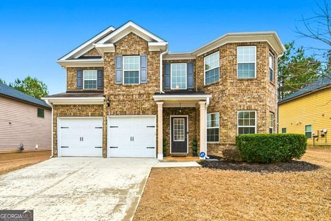 Photo of 7648 Wrotham Cir, Atlanta, GA 30349 (MLS # 10695408)