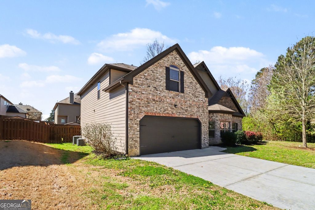 Photo of 221 Traditions Drive, Loganville, GA 30052 (MLS # 10711575)