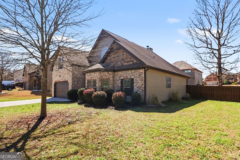 Photo of 221 Traditions Drive, Loganville, GA 30052 (MLS # 10711575)