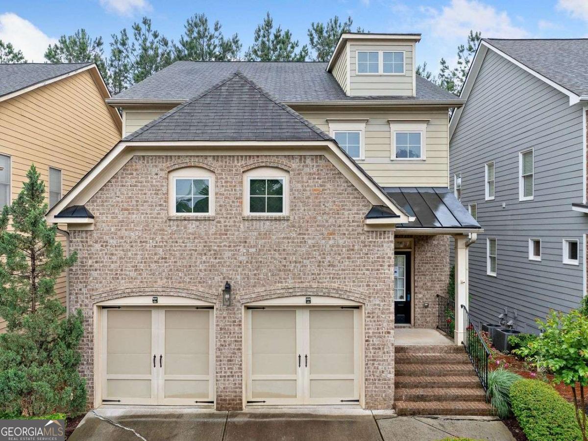 Welcome to this amazing 6 bedroom, 4.5 bath home in the heart of Suwanee. Very convenient to I85 & Suwanee Town Center, restaurants, shopping and family friendly activities. Beautiful eat in kitchen with breakfast bar, granite counters & tile back splash. This great open concept style allows you to entertain effortlessly, while enjoying the warmth and beauty of the gas fireplace. Step out on the deck for grilling and entertaining. The formal dinning room seats 12 and is beautifully finished with picture & chair moldings. The large primary features tray ceiling, a sitting room/area & walk in closet. Primary bath boasts tile walk in shower, double vanity, and soaking tub. Three additional bedrooms and two additional bathrooms complete the second floor. The finished basement has two additional bedrooms, jack & jill bathroom, living room area, office area and a walk out patio for entertaining.