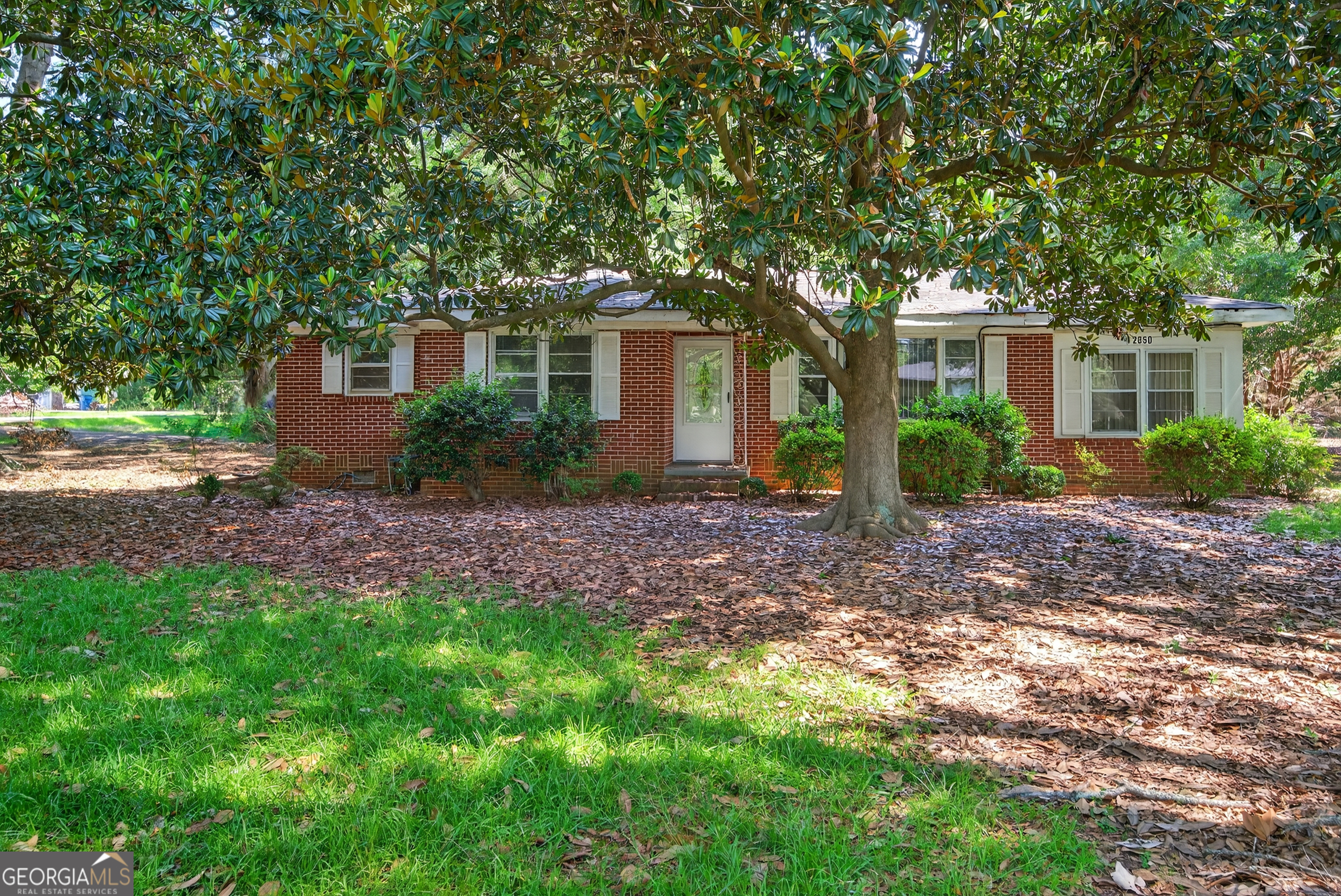 CALLING ALL INVESTORS! Fantastic opportunity to own this all brick beauty in a highly desirable location on Eastside Athens! This home features 2 bedrooms, 1 bathroom, great room, formal dining room, kitchen and 2 sunrooms (1 being a laundry suite). The expansive corner lot right off of Cherokee Road makes this a true hidden gem! Sold as is.