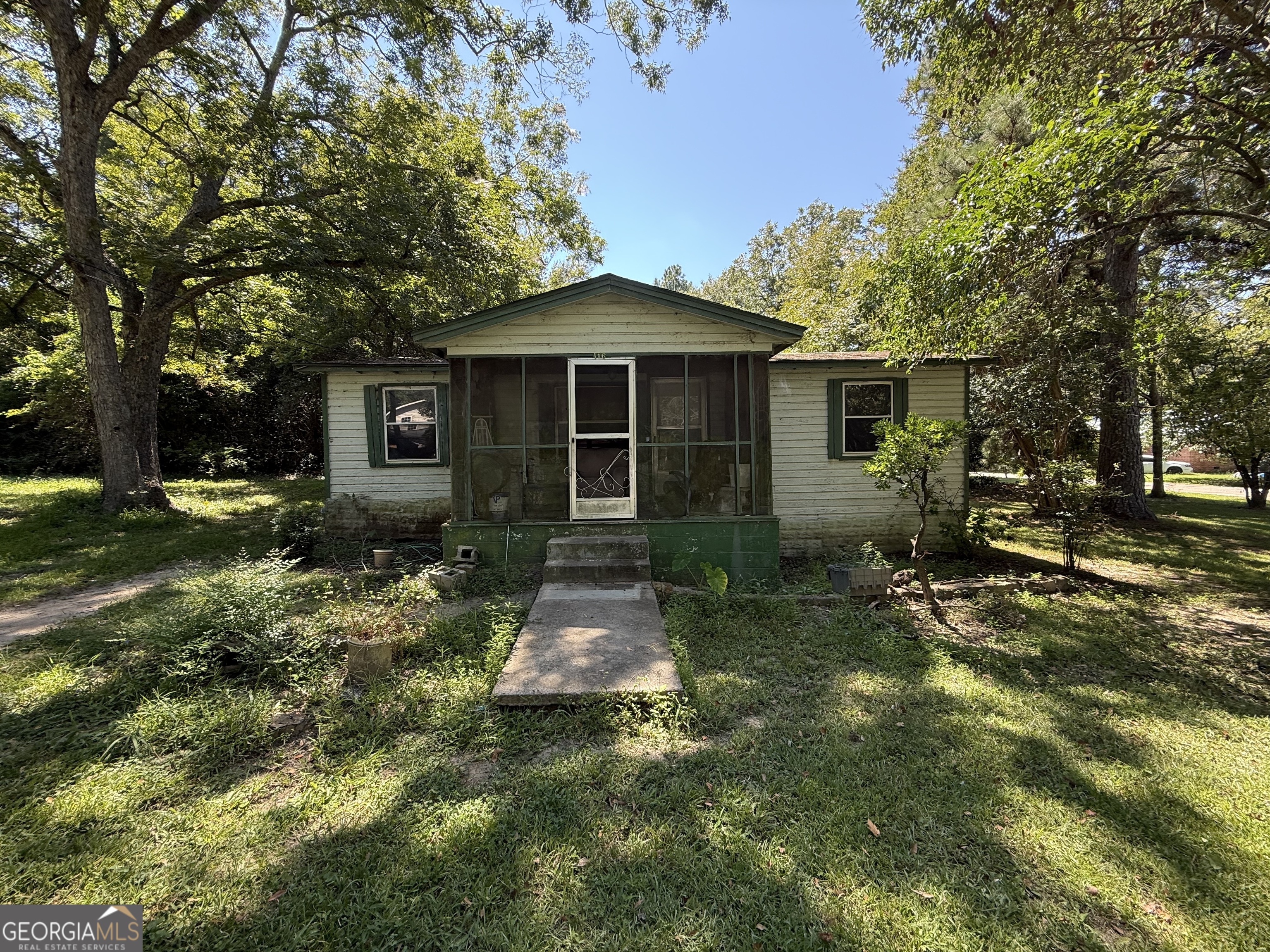 This 3 bedroom, 1 bath home offers 814 sq. ft. of potential and is waiting for the right buyer to bring it back to life. With solid bones and a classic layout, this property is a great opportunity for investors or handy homeowners looking for a project. It needs some TLC, but once updated it could make a great rental, flip, or starter home. Conveniently located and priced to sell, this one won't last long! SOLD AS IS!