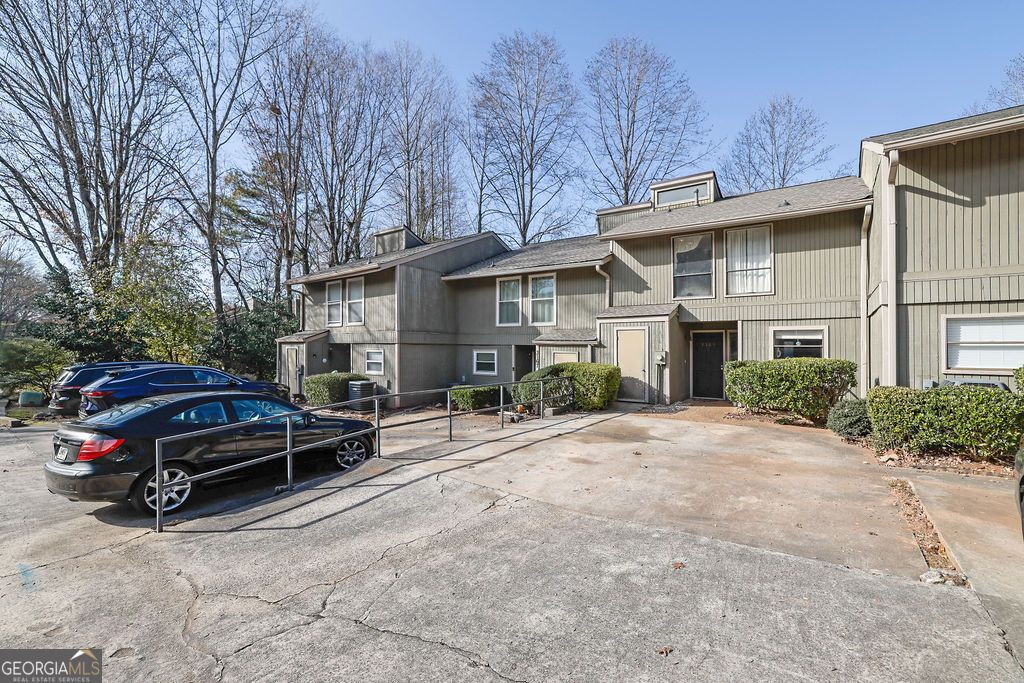 Photo of 3165 Woodland Road, Peachtree Corners, GA 30092 (MLS # 10656793)