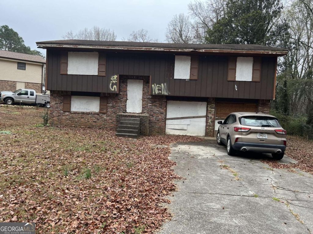 Photo of 5827 Christopher Lane, Lithonia, GA 30058 (MLS # 10656689)