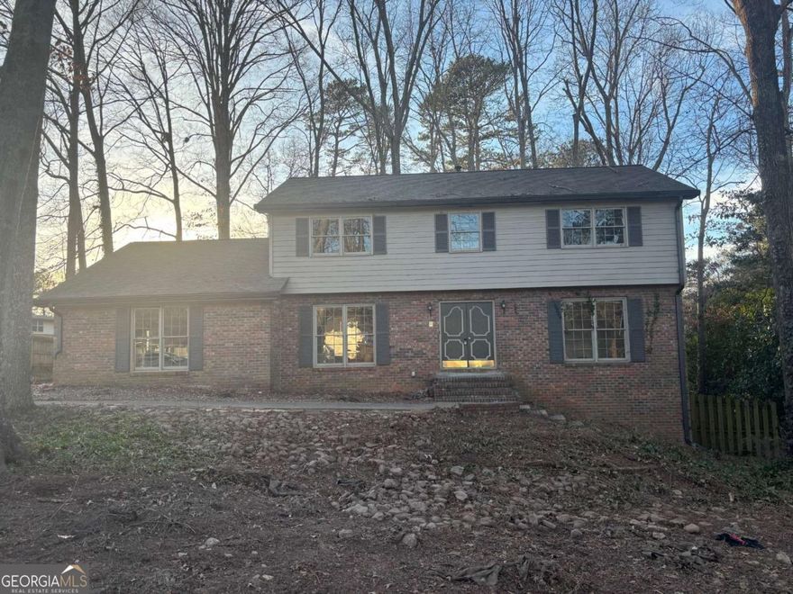 Your fixer upper in desirable Wheeler high school district awaits you!! Over 3900 sqft featuring 5 bedrooms and 3 full baths plus a full basement! Hardwood floors in almost every room of the home and super functional floor plan already! Bonus office room with fireplace on main!