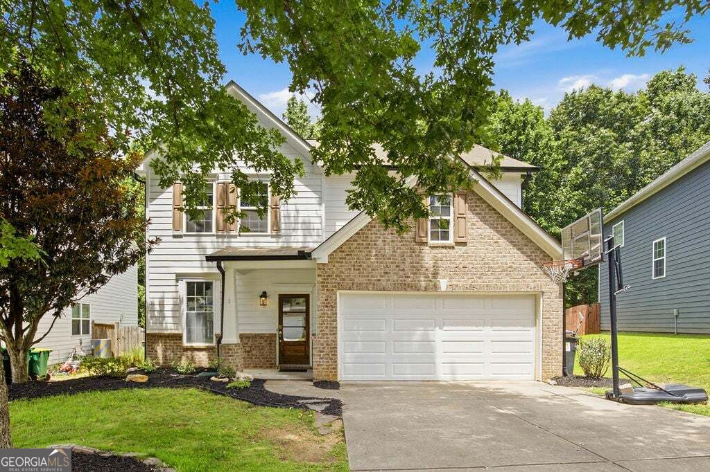 Photo of 560 Crestmont Lane, Canton, GA 30114 (MLS # 10877444)