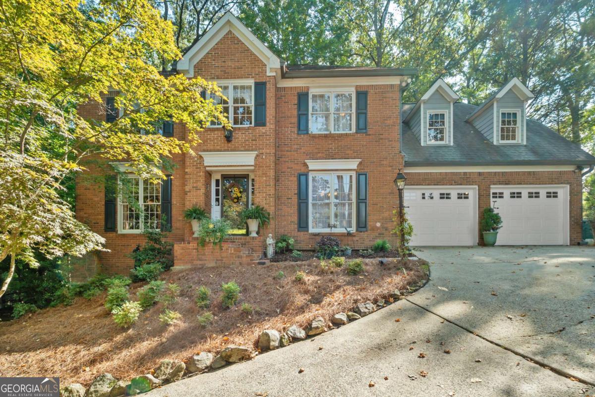 Welcome to Arbor Bridge! Nestled in one of East Cobb's favorite neighborhoods, this charming gem offers more than just a home, it's a lifestyle. Located in the award-winning Lassiter High, Mabry Middle, and Rocky Mount Elementary school district, Arbor Bridge is alive with energy and community spirit. From the bustling swim team and year-round tennis to festive seasonal parties, children's parades, and book clubs, there's something here for everyone. Step inside to find a home filled with warmth and character. Refinished hardwood floors, crown molding, and timeless details set the stage. The fireside great room is the heart of the home, flowing into a cozy study, cheerful sunroom, and bright, welcoming kitchen, perfect for both daily living and entertaining. Step out from the sunroom onto the back deck and discover your own private, landscaped retreat, an enchanting backdrop for morning coffee or evening gatherings. Upstairs, you'll find five bedrooms and two baths with updates, giving everyone their own space. The full unfinished basement is brimming with potential, whether you dream of a media room, gym, play space, or simply need abundant storage. Arbor Bridge is ideally located with easy access to schools, grocery stores, shopping, and entertainment. You're minutes from the Marietta Square, historic downtown Roswell, lively Woodstock, Costco, and the Outlet Shops. This isn't just a place to live-it's a place to belong, complete with wonderful neighbors and endless opportunities for connection. Come see why life in Arbor Bridge is so special!