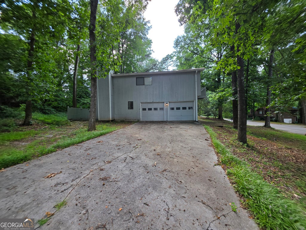 Photo of 5085 Rock Glen Dr, Stone Mountain, GA 30088 (MLS # 10806269)