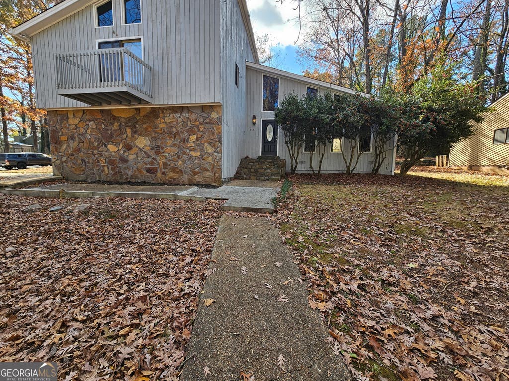 Photo of 5085 Rock Glen Dr, Stone Mountain, GA 30088 (MLS # 10806269)