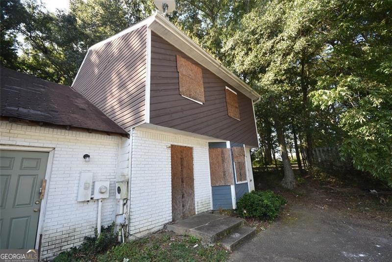 Investor Special! Rare opportunity to acquire a brick-front townhome in Douglasville with strong upside potential. This 2-bed, 2.5-bath unit offers a spacious layout and sits in a quiet community just minutes from downtown and I-20. Property needs full renovation-perfect for rehabbers or portfolio buyers looking to add value. Zoned for Douglas County High School with school bus access. Adjacent units may be available for bulk purchase. Cash or hard money preferred. Sold as-is. No blind offers. Schedule your showing today and unlock the potential of Ashley Way.