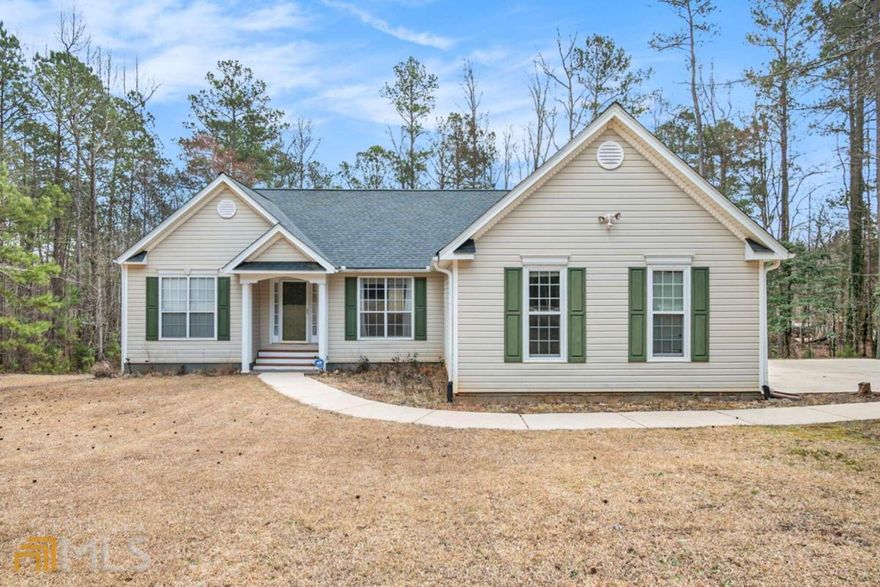 ENTER YOUR PRIVATE ESTATE and welcome to your home, perfectly positioned on the 5.48 ACRE lot! This home features an entry foyer with updated laminate HARDWOOD FLOORING throughout. The FAMILY room is SPACIOUS and features VAULTED CEILINGS. The OPEN family room is the ideal gathering place for entertaining or spending quiet family evenings around the COZY, gas starter FIREPLACE. The family room also grants access to a separate and open DINING room that could be easily used as an office, sitting room or kids play area. The EAT-IN kitchen features a NEW STOVE and NEW DISHWASHER, a pantry and an abundance of cabinets for easy organization and storage. The primary suite is OVERSIZED and also features VAULTED Ceilings and a spectacular view of the backyard! The primary bath features dual vanities, a WALK-IN closet, a separate STANDING shower and a GARDEN TUB, perfect for relaxing after a long day. Additional bedrooms are also spacious with adequate closet space. It doesn't end there! The PARTIALLY finished basement features a finished FULL BATH, NEW professionally installed water shut off value, NEW dual exterior access doors and best of all, it awaits your customization for a MAN CAVE, Home Theater, In-Law Suite, etc. the possibilities are limitless! ENJOY your private outdoor oasis and relax or entertain on the REAR DECK day or night! You can enjoy watching Deer and Wild Turkeys OR listen to the RELAXING flowing Stream. NEW WELL installed 2016 and Public water is available at the road. Transferrable Home Warranty with American Home Shield. DON'T WAIT! Make this YOUR NEW HOME TODAY!!!!