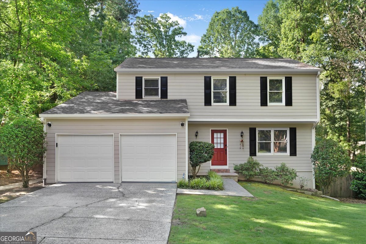 Welcome to this stunning move-in ready home located in one of East Cobb's most desirable neighborhoods and zoned for the award-winning Walton High School district. This beautifully updated property features brand new flooring, fresh paint throughout, and gleaming new stainless steel appliances. With durable Hardi plank siding and architectural shingles, the exterior is built to last and impress. The fabulous kitchen opens to the family room through a charming arched opening and includes a convenient breakfast bar, perfect for both everyday living and entertaining. The serene, level backyard is fully fenced and offers a large deck, screened porch, and a built-in gazebo-an ideal space for relaxing or hosting guests. Professionally landscaped with lush Zoysia grass in both the front and back yards and equipped with an irrigation sprinkler system, the outdoor space is as functional as it is beautiful. Located just a short walk from Avenues shopping center, dining, and theaters, this home combines comfort, convenience, and curb appeal. With low Cobb County taxes and close proximity to top-rated schools, this home offers exceptional value in a prime location. Don't miss your chance to own this dream home in the heart of East Cobb.