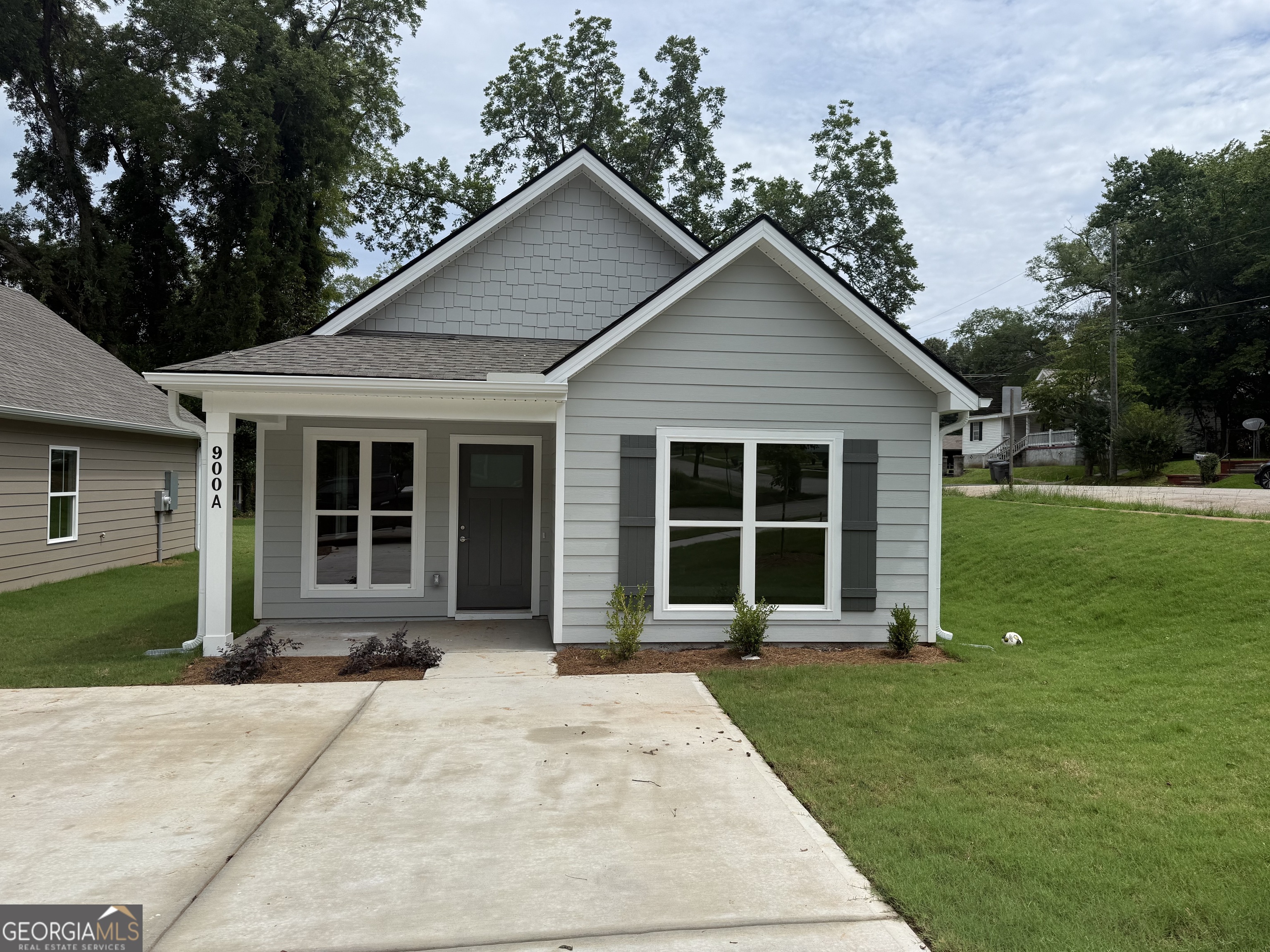 It is READY.......$5,000 builders allowance toward closing and additional $1,000 in preferred lender incentives. Great affordable new 2 bedroom home convenient The Thread, Downtown, college and shopping. Carpet in Bedrooms and Luxury Vinyl Tile in all other areas. Granite counter tops in Kitchen and baths.