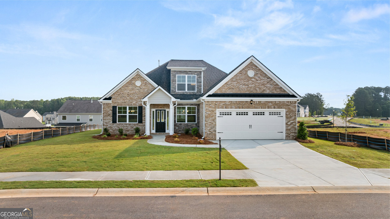 GOLF CART PATH TO HISTORIC DOWNTOWN SENOIA | MINUTES TO PEACHTREE CITY WITHOUT THE PRICE TAG | OVERSIZED LOTS WITH WOODED PRIVACY The Marlene is a beautiful ranch plan with 4 bedrooms and 3 baths, plus a bonus room upstairs with a full bath. The main level showcases an open-concept design with an oversized island, quartz countertops, stainless steel appliances, and stylish cabinetry flowing seamlessly into the dining and living areas. The owner's suite features an oversized walk-in closet with direct access to the tiled laundry room, along with a spa-style bath including double vanities, soaking tub, and separate shower. Two secondary bedrooms share a well-appointed bath, and a convenient fourth bedroom with access to a full bath offers added flexibility. Upstairs, the bonus room with full bath provides the perfect space for guests, a media room, or private retreat. Covered porch overlooks wooded backyard. Resort-style amenities include a sparkling aquatic center with cabana seating, tennis and basketball courts, playground, and clubhouse for gatherings. Smart home technology included. Photos are for illustrative purposes only and may not reflect actual home finishes.
