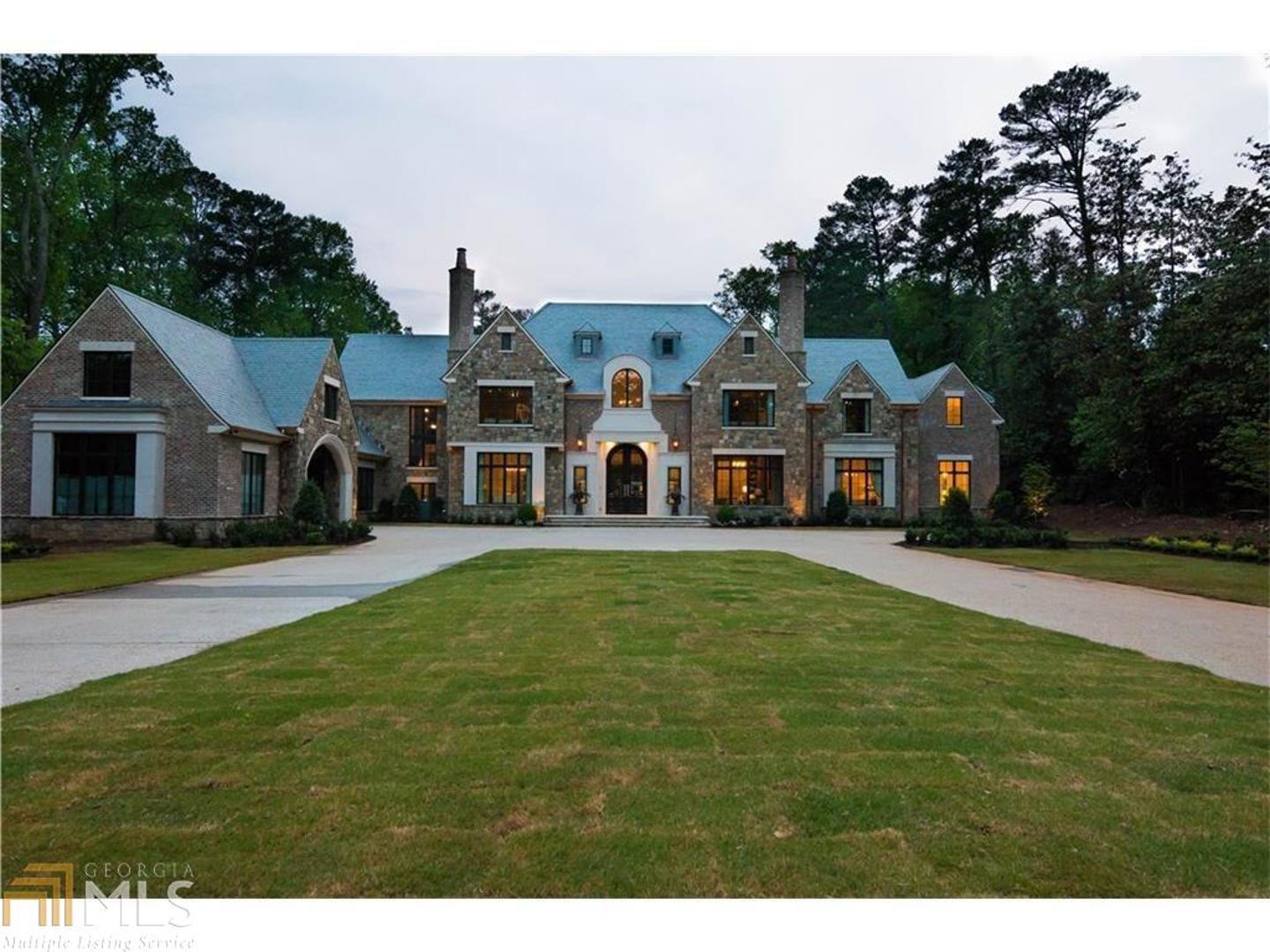 Masterpiece! 3.5 acre estate in Buckhead's Tuxedo Park! Exquisite English Manor Mansion with spacious terrace level, pool house, infinity pool and patios with outdoor living space. 2 story foyer opened to a pair of arched staircases on both sides overlooking the two story great room with wall of windows overlooking pool and open to kitchen. 2 story master with fireplace, separate closets for him and her. Terrace level includes entertainment, media, exercise & spa. 2 story Pool house is unbelievable with bedroom and bath on lower level. Welcome to Buckhead's Finest!