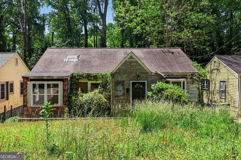 Photo of 1676 S Olympian Way SW, Atlanta, GA 30310 (MLS # 10767439)