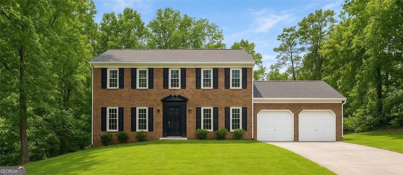 Discover this beautifully updated 4-bedroom, 2.5-bath traditional home tucked into a quiet cul-de-sac in the heart of East Cobb. Located in an established neighborhood surrounded by mature trees and well-maintained homes, 1911 Woodmont Ct NE offers both space and style in a highly desirable Marietta location. Inside, you'll find an open-concept layout filled with natural light, refreshed lighting, and upgraded flooring throughout the main level. The inviting living area flows seamlessly into the dining and kitchen spaces-perfect for entertaining or relaxing. The owner's suite features a completely redesigned ensuite bath, offering a serene retreat at the end of the day. Three additional bedrooms provide flexible options for guests, office space, or family needs. Enjoy a level backyard with space to host, garden, or play-plus a two-car garage and wide driveway for additional parking. Located just minutes from Harrison Park, Sweat Mountain Dog Park, Noonday Creek Trail, and convenient shopping and dining along Sandy Plains Road, the home offers both peace and accessibility. Commuters will appreciate quick access to I-75, Roswell Road, and Downtown Marietta, while students are zoned for East Side Elementary, East Cobb Middle, and Wheeler High School. Buyers are encouraged to verify school zoning and explore programs through the Cobb County School District. With modern updates, flexible living space, and a prime East Cobb location, this move-in-ready home is one you won't want to miss. Schedule your showing today-homes like this don't last long.
