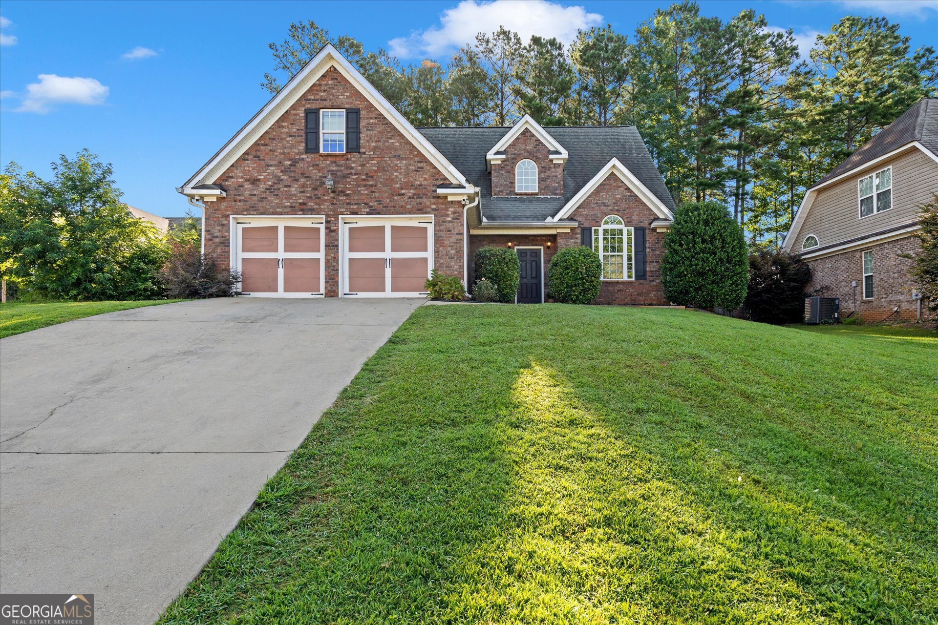 Welcome to this beautiful two story home, thoughtfully designed with modern comforts and stylish finishes throughout. The kitchen and bathrooms are adorned with elegant granite countertops, complemented by rich hardwood flooring that flows seamlessly through the main living areas. Stainless steel appliances and contemporary paint tones create a sleek, inviting atmosphere perfect for everyday living and entertaining. Upstairs, a spacious bonus room offers incredible flexibility-ideal for a fourth bedroom, home office, media room, or playroom to suit your lifestyle needs. Cozy up by the fireplace on cool evenings, or spend sunny afternoons unwinding by the community pool in the desirable Magnolia neighborhood. This home offers the perfect blend of functionality, style, and community charm-don't miss your chance to make it yours! This home is total electric! Zoned in the award winning BREMEN CITY SCHOOL SYSTEM! Be sure to also check out the private HOA pool! To get to it use 100 Club Drive, Bremen and it'll take you straight to it.