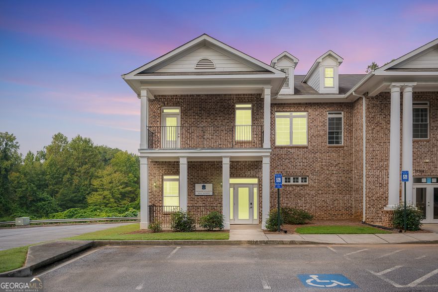 Positioned between North Point Mall and Avalon with immediate access to GA-400, this professional office suite offers the space, layout, and location ideal for business owners ready to establish or grow their presence in Alpharetta. The property includes both the main level and fully finished basement-leased together for a combined 2,400 square feet. The main level features four private offices, a reception area, a dedicated bathroom, and a kitchenette, all with high ceilings and excellent natural light. The lower level provides flexible space perfect for team meetings, training, or additional work areas, with a separate entrance for added functionality. Ample on-site parking, well-maintained landscaping, and front and rear entry points complete the package. Whether you're in legal, financial, tech, or medical services, this space is designed to support day-to-day operations in a location that connects you to Alpharetta's business and lifestyle centers.