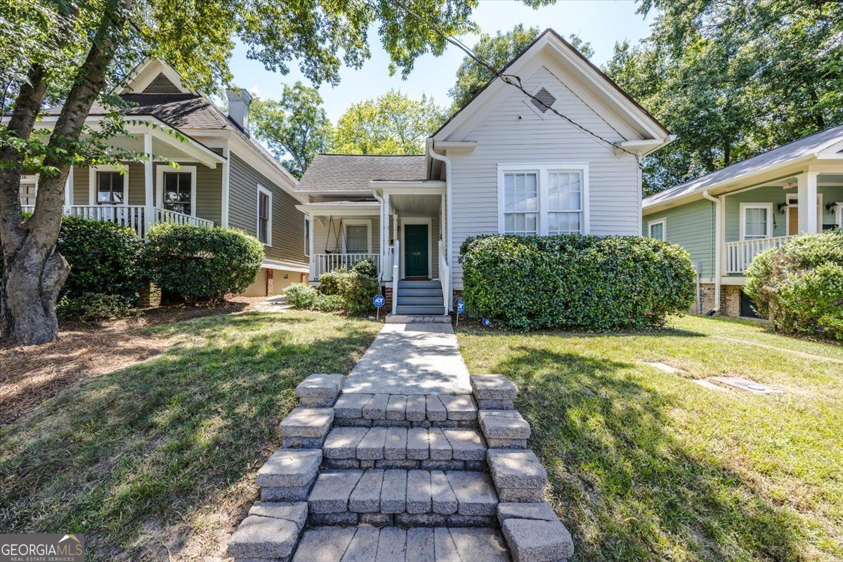 Charming Cottage updated and gorgeous! This 2 bedroom 2 bath cottage has beautiful hardwood floors, tall ceilings, charming front porch, back deck with private fenced in back yard. Walk to Tatnall Sq Park and Mercer Village. Two doors down from Mercer Medical and Engineering Schools. Convenient to Navicent Hospital and all of fun historic downtown Macon!!